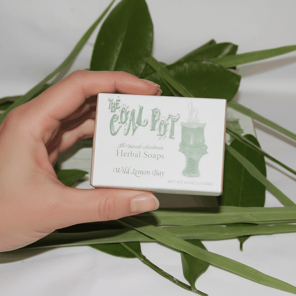 Bath Soaps/Coal Pot herbal soap in a cream paper box with pale green lettering and a Wild Lemon Bay label.