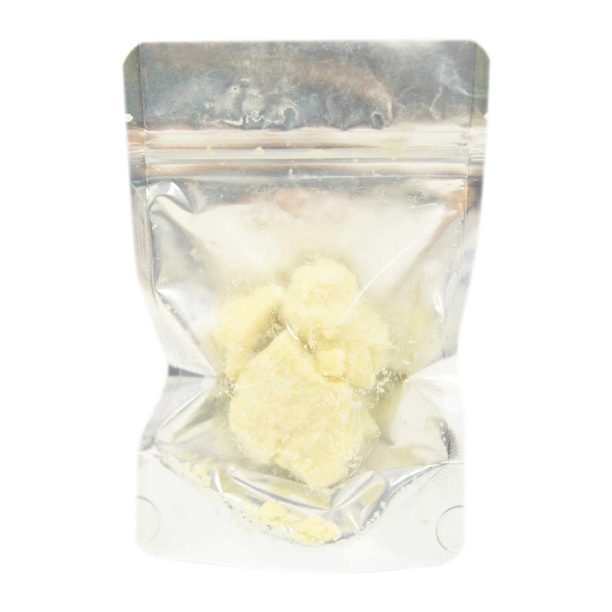 Jolly's Coco Fat Blocks are pale yellow solid pieces packed in a clear resealable pouch, with a crumbly texture.