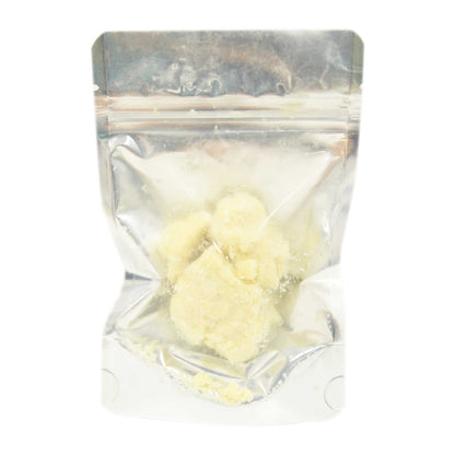 Jolly's Coco Fat Blocks are pale yellow solid pieces packed in a clear resealable pouch, with a crumbly texture.
